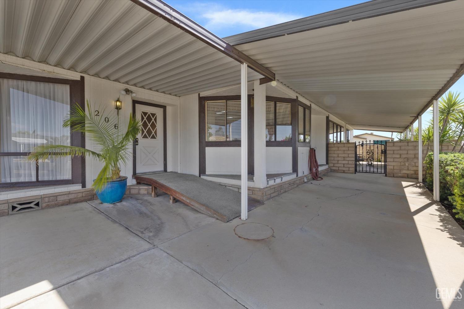 Undisclosed Address Bakersfield, CA 93306 - Photo 4 of 37 a view of a house with porch