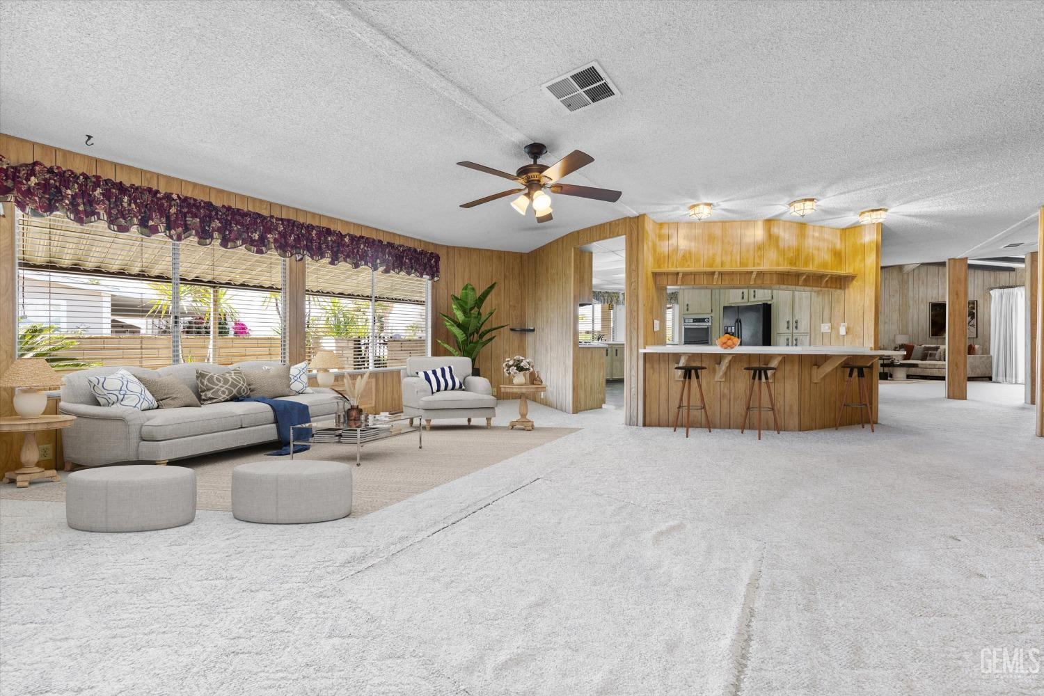 Undisclosed Address Bakersfield, CA 93306 - Photo 6 of 37 a living room with furniture and a large window