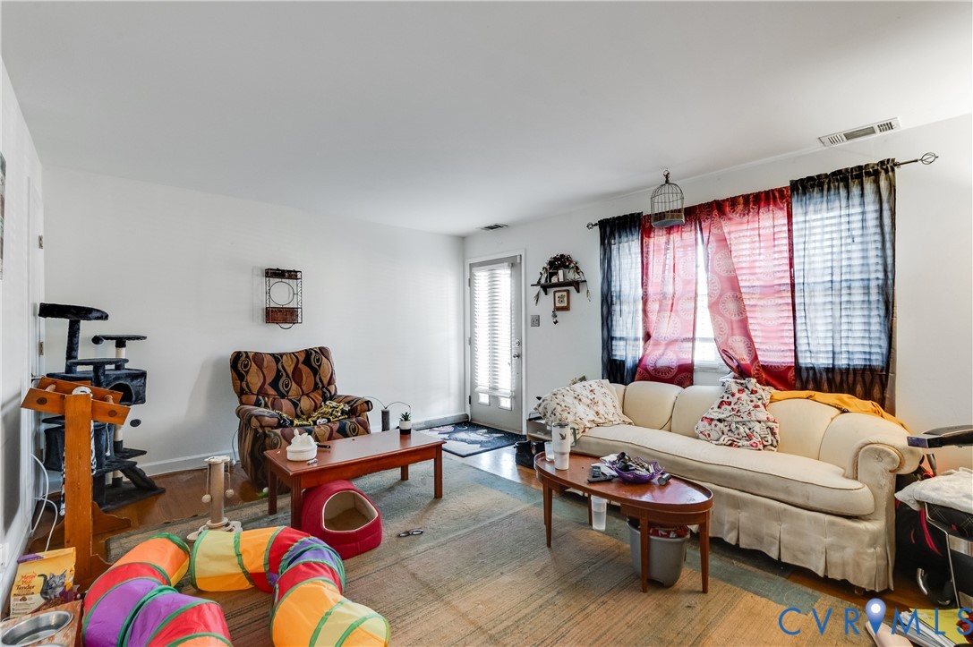 3109 North Parham Road, Unit 9 Henrico, VA 23294 - Photo 7 of 19 Living room featuring wood finished floors and bas