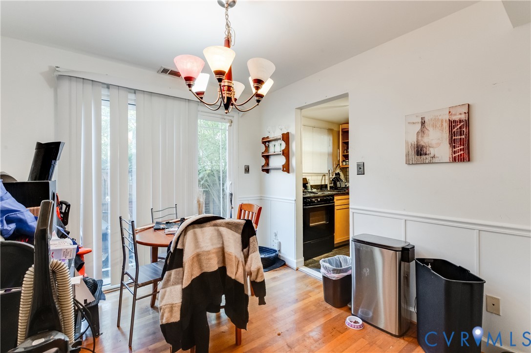 3109 North Parham Road, Unit 9 Henrico, VA 23294 - Photo 8 of 19 Dining space with light wood-style floors, a wains
