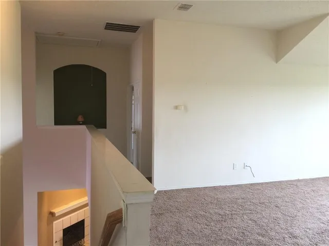 a view of entryway with mirror