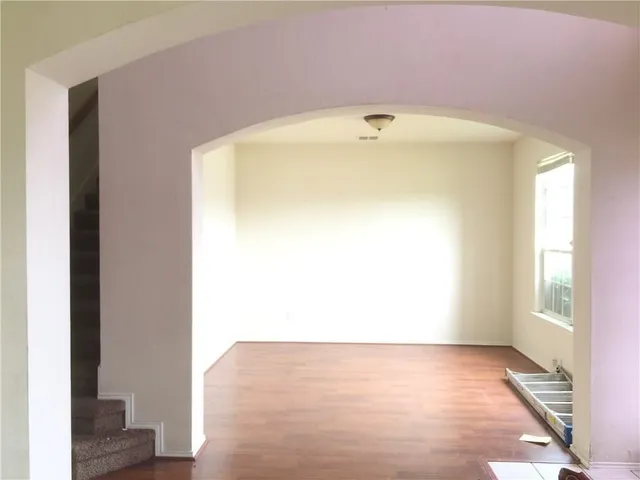 a living room with a fireplace