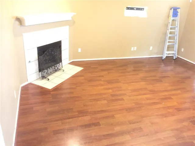 a room with a sink and a mirror