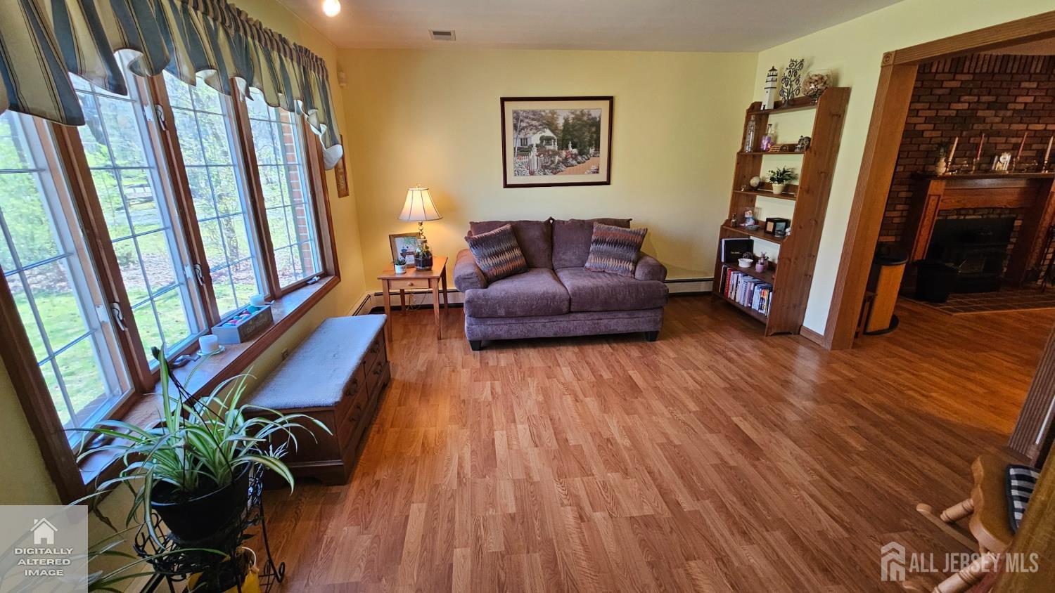 263 New Road Monmouth Junction, NJ 08852 - Photo 14 of 70 a living room with furniture and a wooden floor