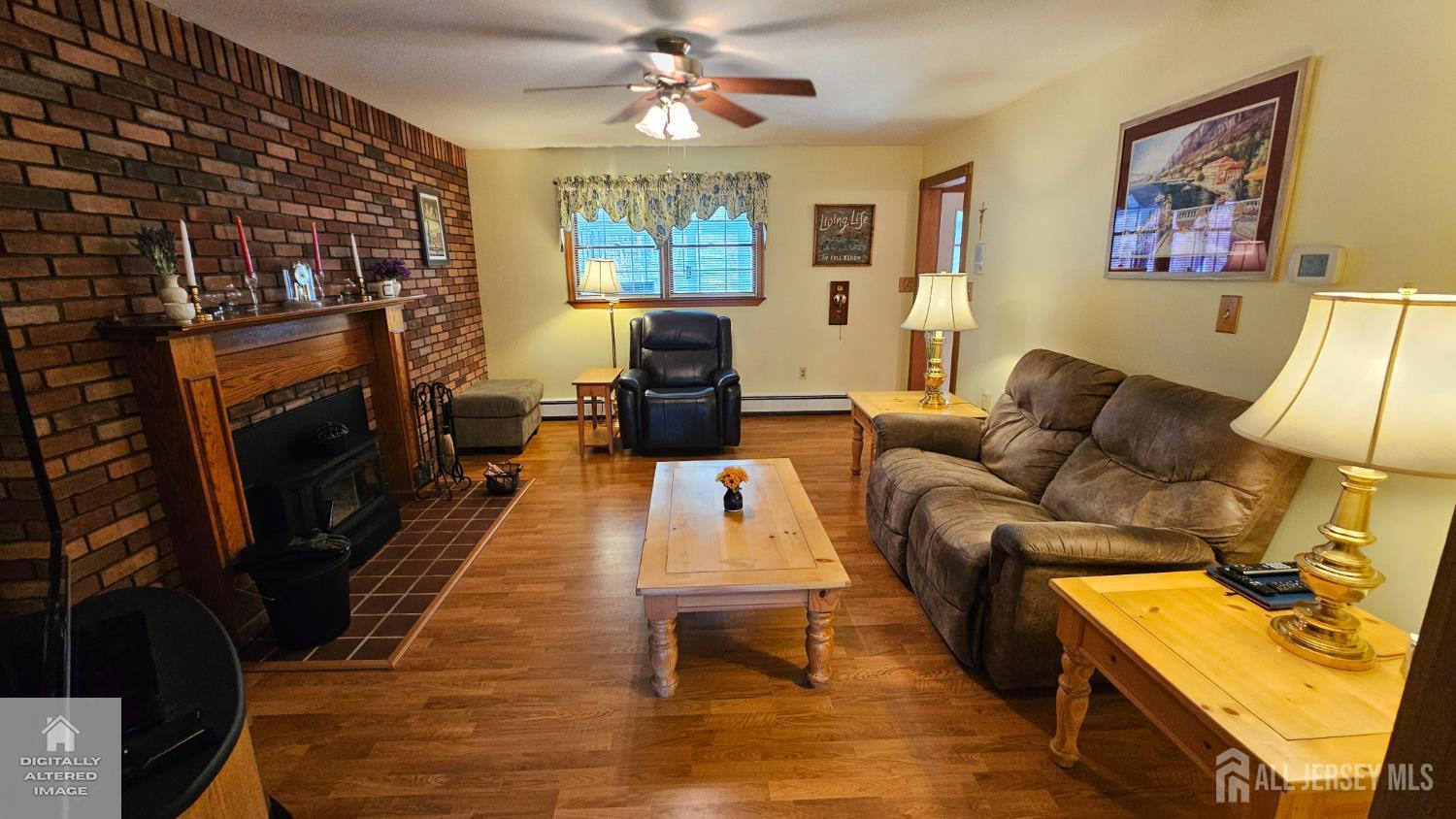 263 New Road Monmouth Junction, NJ 08852 - Photo 19 of 70 a living room with furniture and a fireplace