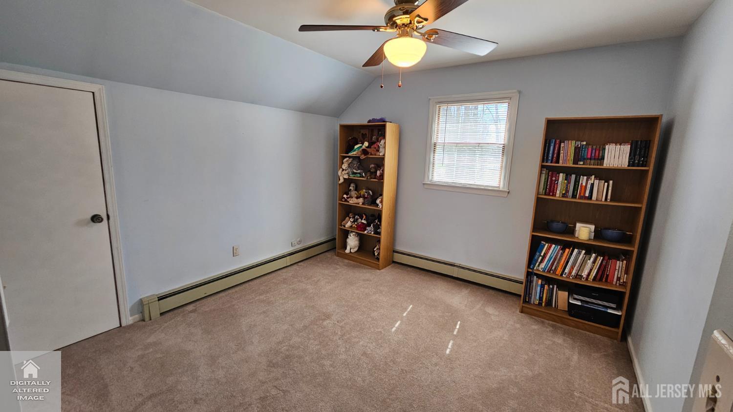 263 New Road Monmouth Junction, NJ 08852 - Photo 39 of 70 a view of an empty room with window and cabinet