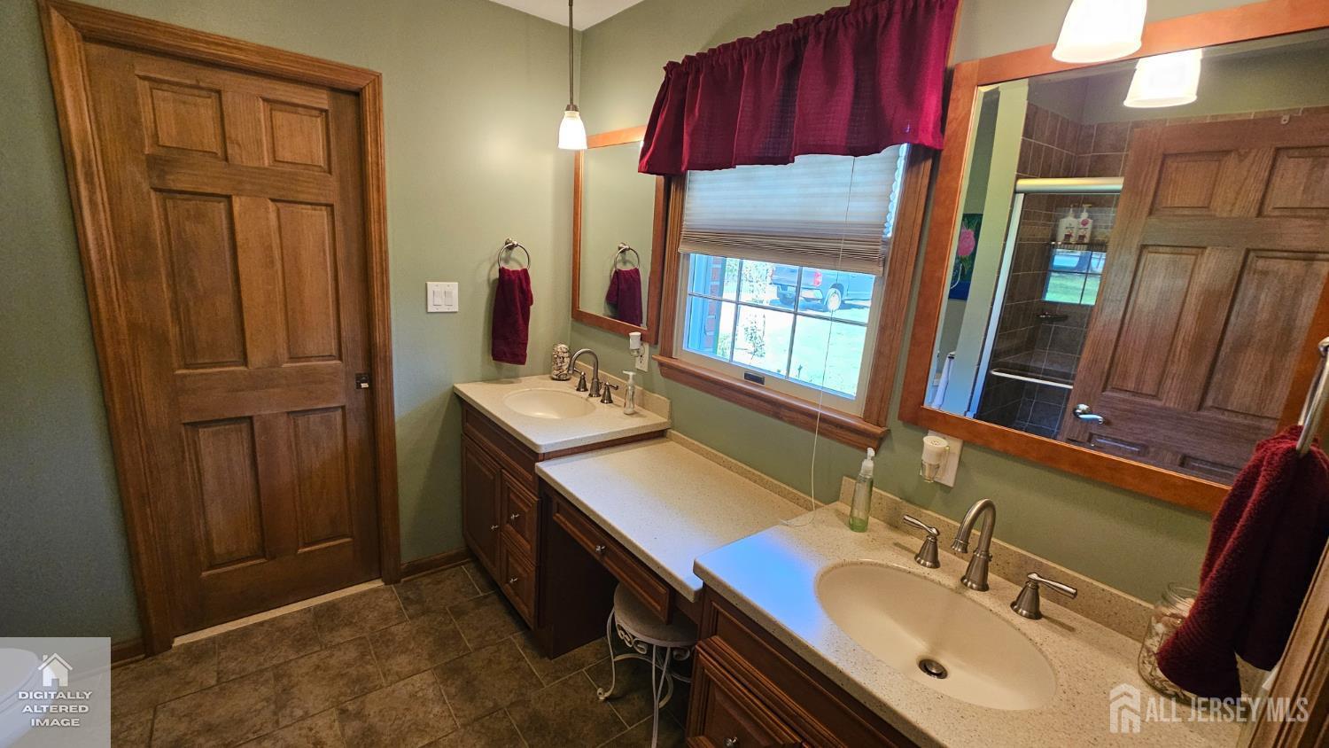 263 New Road Monmouth Junction, NJ 08852 - Photo 48 of 70 a bathroom with a sink vanity granite tub and a mirror