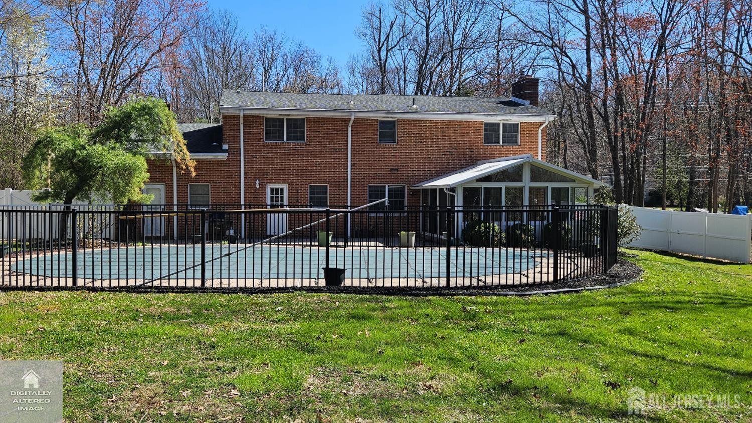 263 New Road Monmouth Junction, NJ 08852 - Photo 5 of 70 a front view of a house with a garden