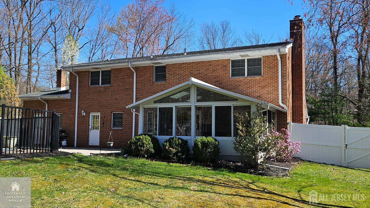 263 New Road Monmouth Junction, NJ 08852 - Photo 6 of 70 a front view of a house with a yard