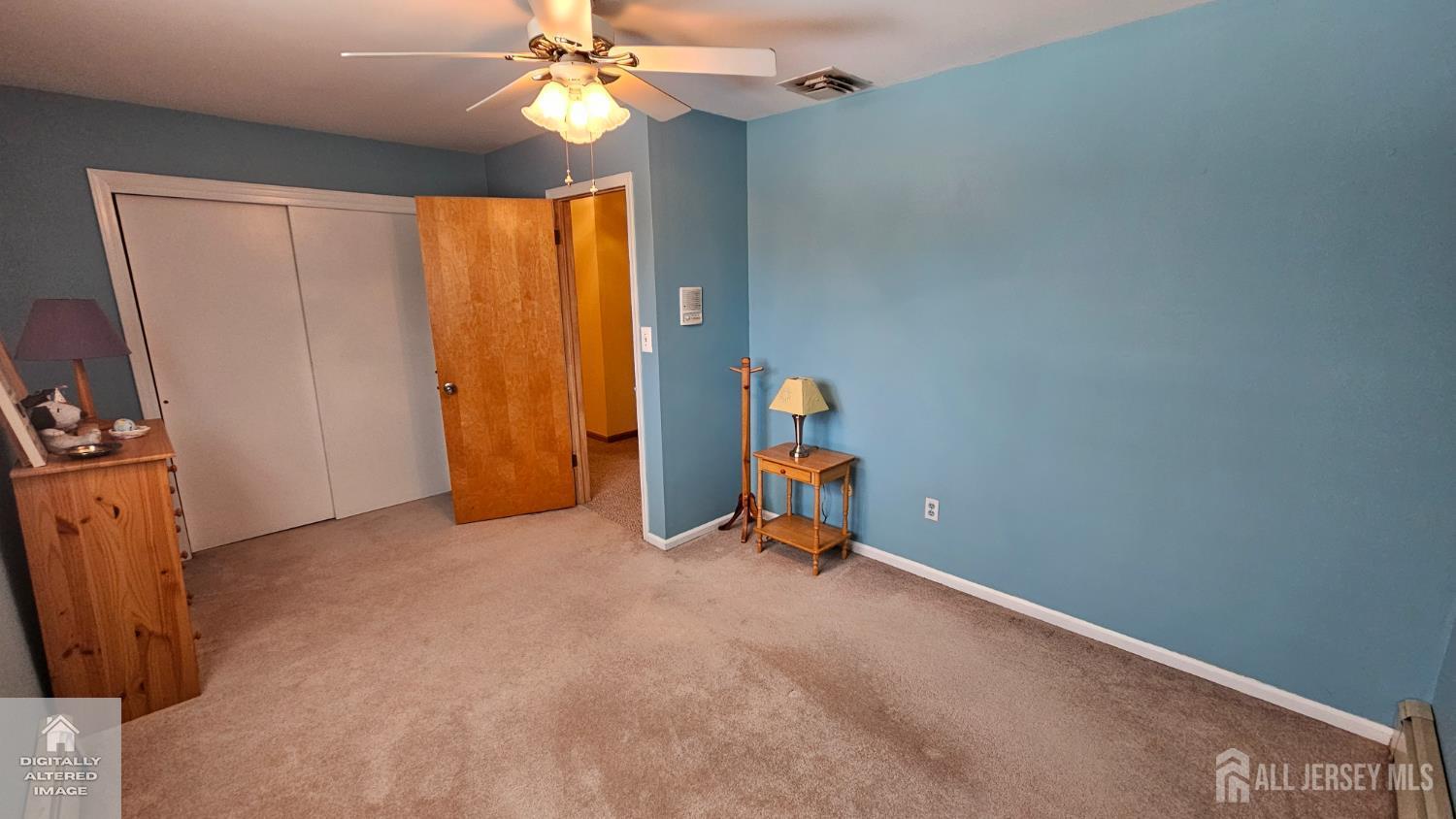 263 New Road Monmouth Junction, NJ 08852 - Photo 68 of 70 a view of a room with gym equipment and a chandelier