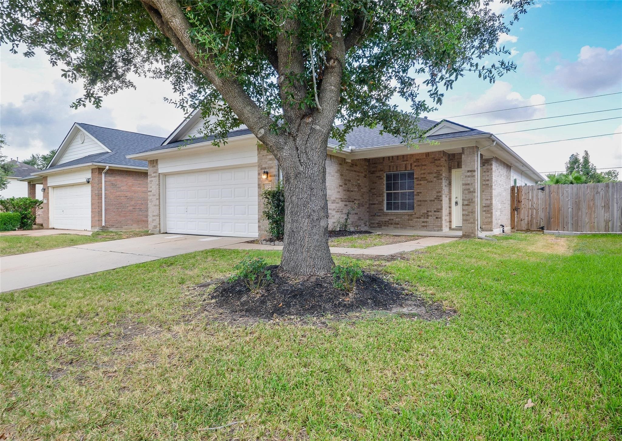 6627 Stonecross Creek Lane Katy, TX 77449 - Photo 2 of 30 a front view of house with yard and green space