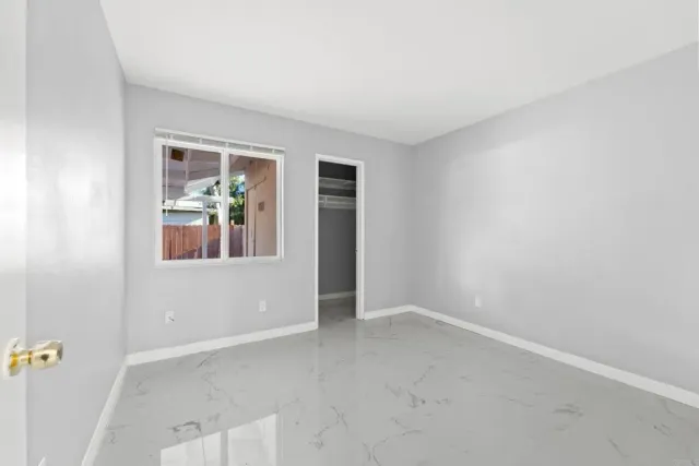 an empty room with windows