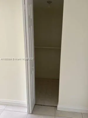 a bathroom with a glass door