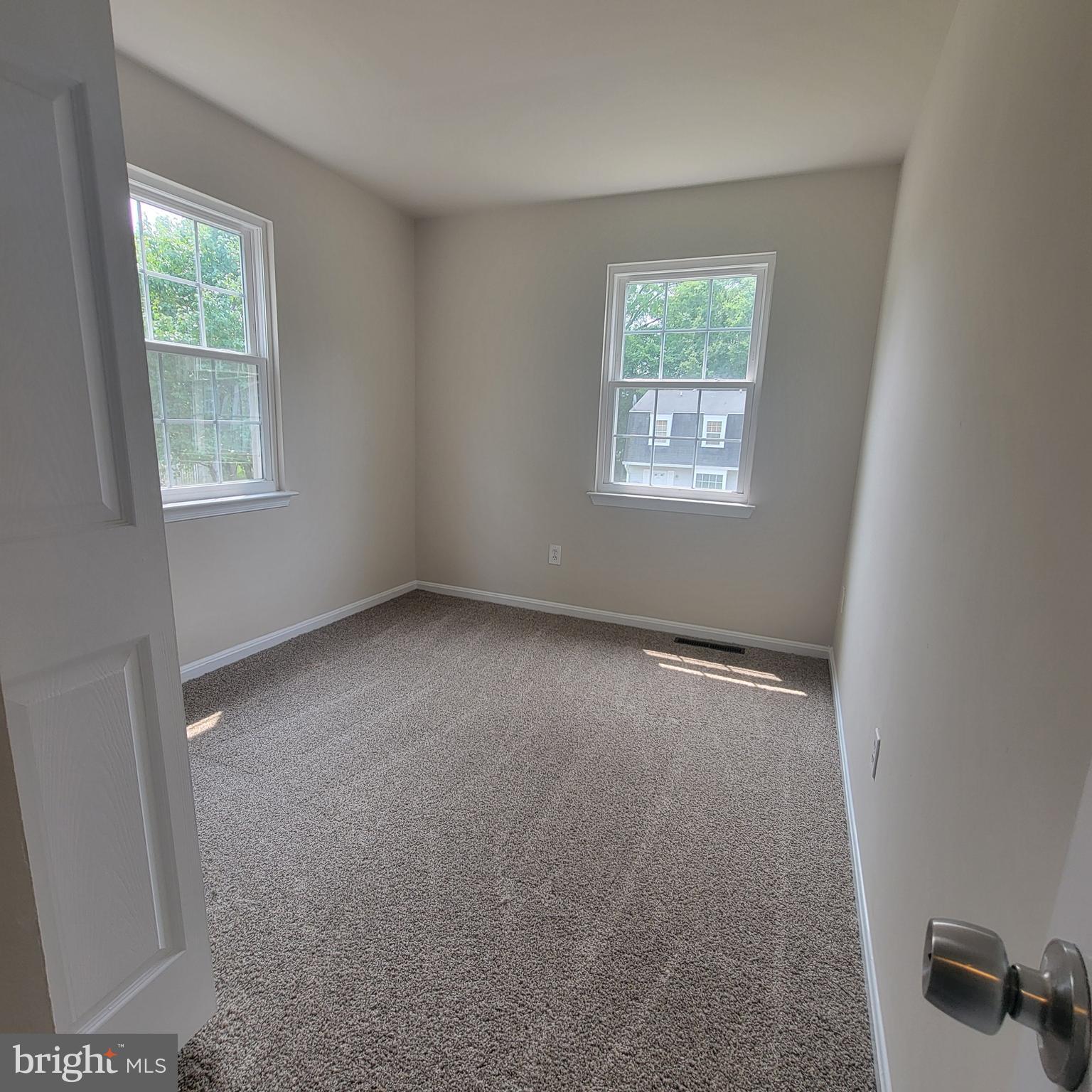 3381 Ryon Court Waldorf, MD 20601 - Photo 9 of 12 an empty room with windows
