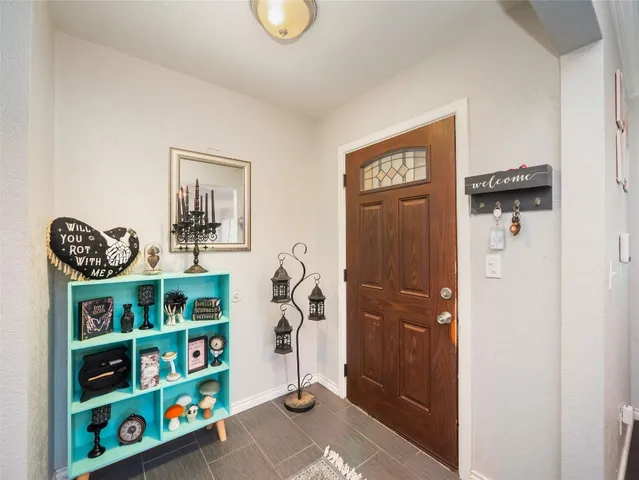 a view of an entryway with a workspace