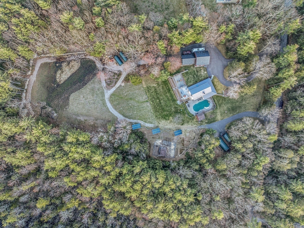 360 Teel Road Winchendon, MA 01475 - Photo 38 of 42 an aerial view of a house with a yard and trees