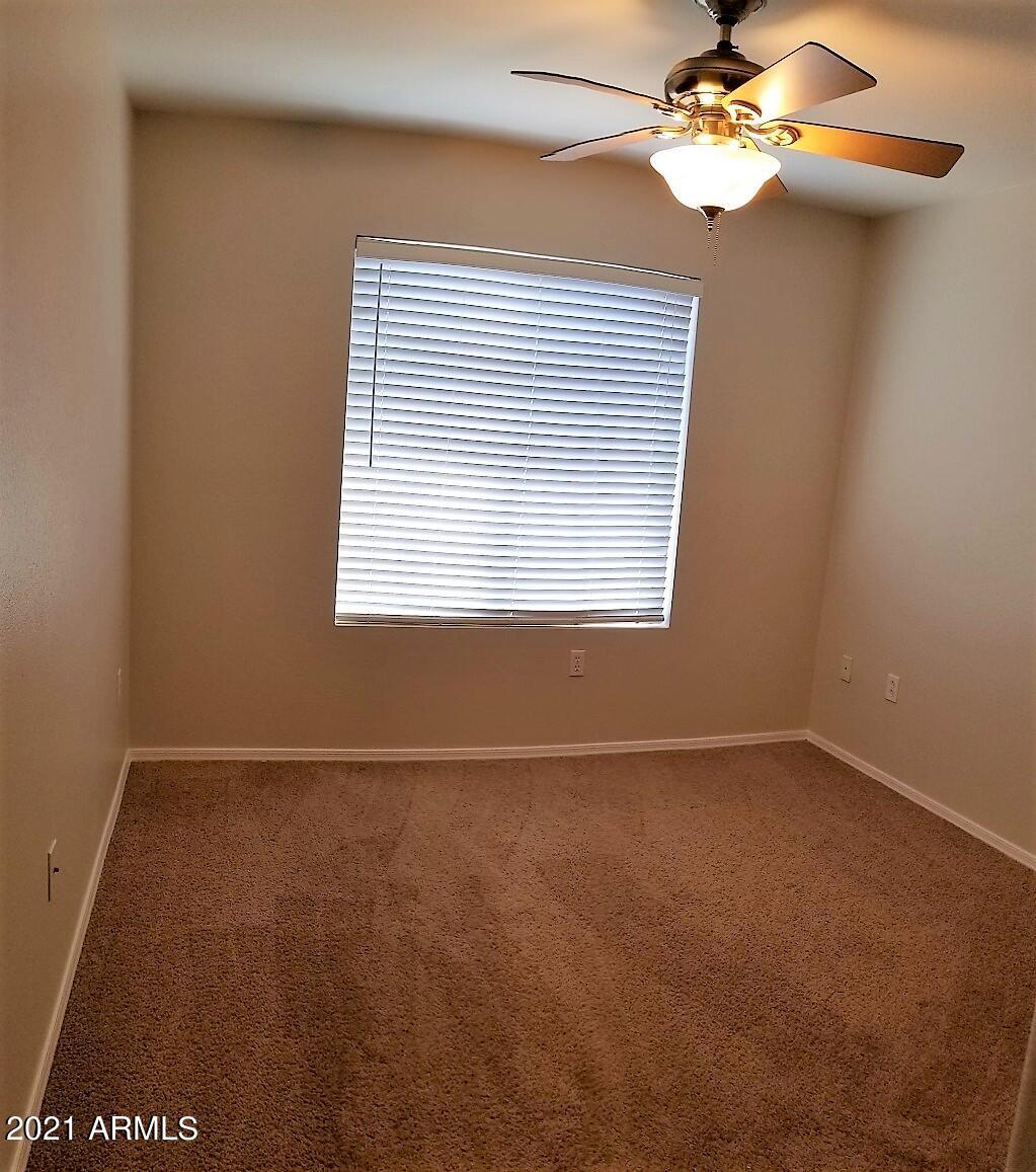 2402 East 5th Street, Unit 1686 Tempe, AZ 85288 - Photo 22 of 25 a view of an empty room with a window