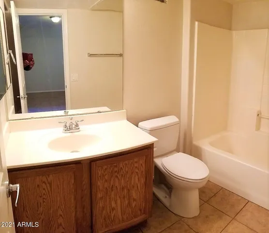 a view of a utility room with closet