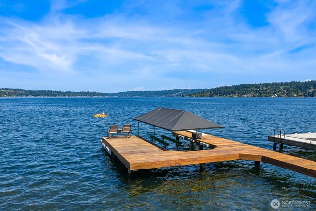 a view of a lake with a patio