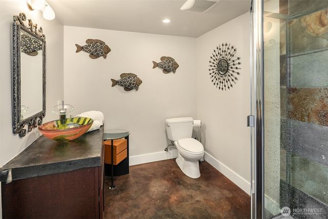 a utility room with sink dryer and washer
