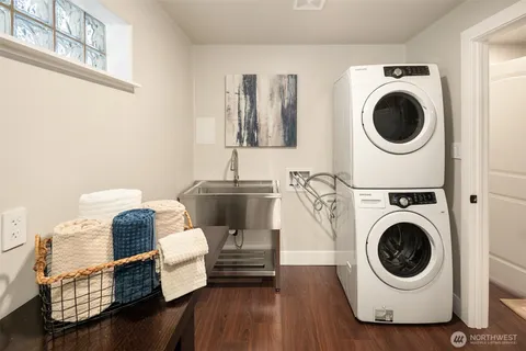 a front view of house with yard and outdoor seating