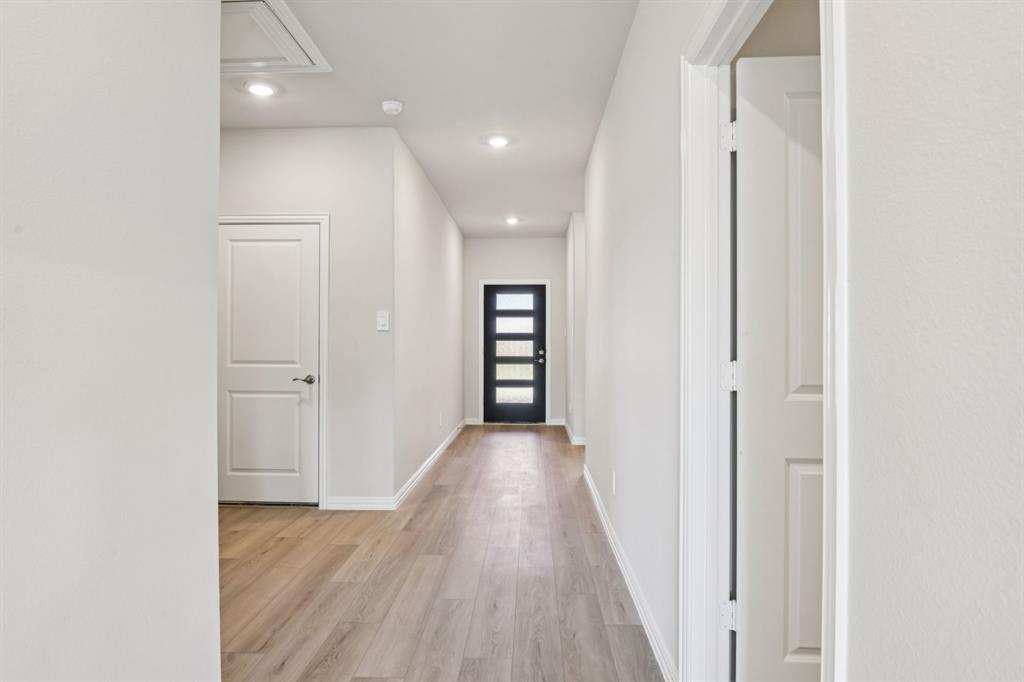 404 Castle Road Sherman, TX 75092 - Photo 11 of 36 Photo is not of the actual home, but is an inspirational photo of builder’s model home and may depict options, furnishings, and/or decorator features that are not included.