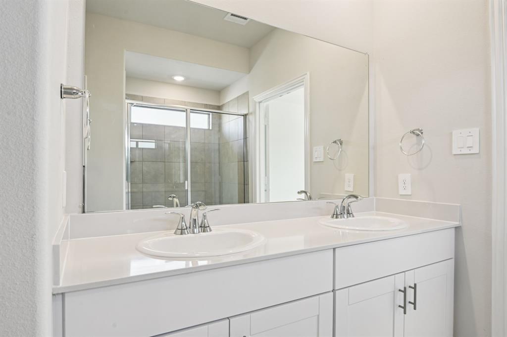 404 Castle Road Sherman, TX 75092 - Photo 22 of 36 Photo is not of the actual home, but is an inspirational photo of builder’s model home and may depict options, furnishings, and/or decorator features that are not included.