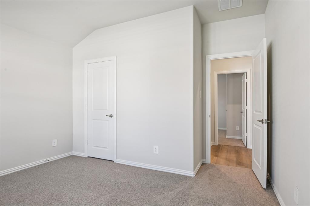 404 Castle Road Sherman, TX 75092 - Photo 29 of 36 Photo is not of the actual home, but is an inspirational photo of builder’s model home and may depict options, furnishings, and/or decorator features that are not included.