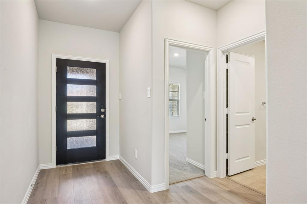 404 Castle Road Sherman, TX 75092 - Photo 7 of 36 Photo is not of the actual home, but is an inspirational photo of builder’s model home and may depict options, furnishings, and/or decorator features that are not included.