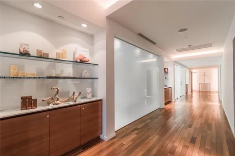 a hallway with wooden floor