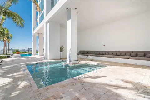 a view of a swimming pool with an outdoor space
