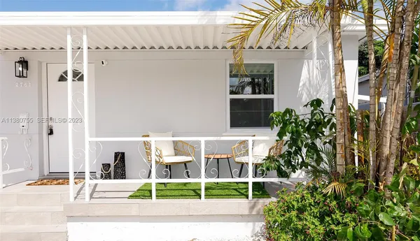 a building outdoor space with patio furniture