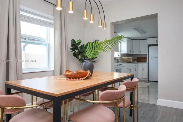 a vase of flowers sitting on a table