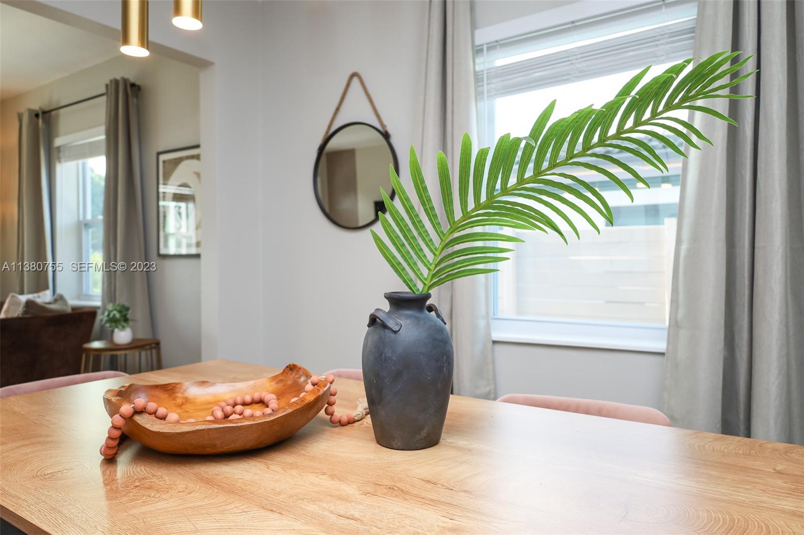 2761 Southwest 33rd Avenue, Unit 1 Miami, FL 33133 - Photo 35 of 46 a vase of flowers sitting on a table