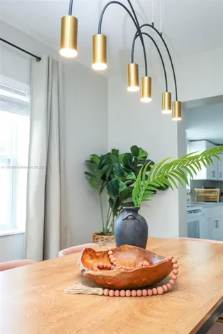 a vase of flowers sitting on a table