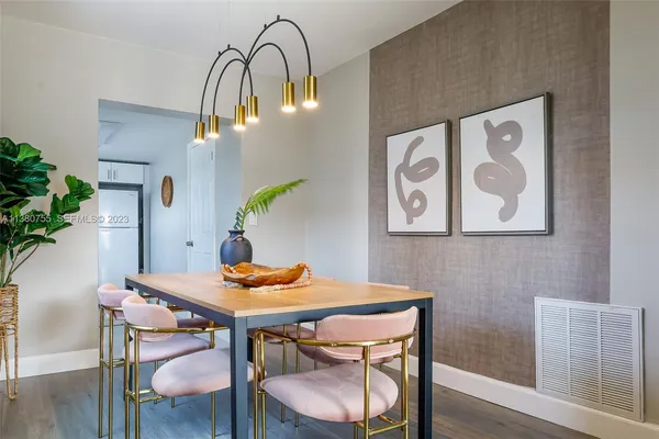 a view of a dining room with furniture