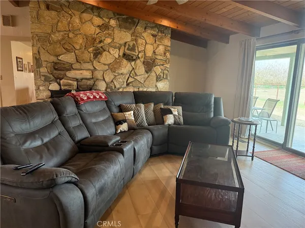 a living room with furniture and a table