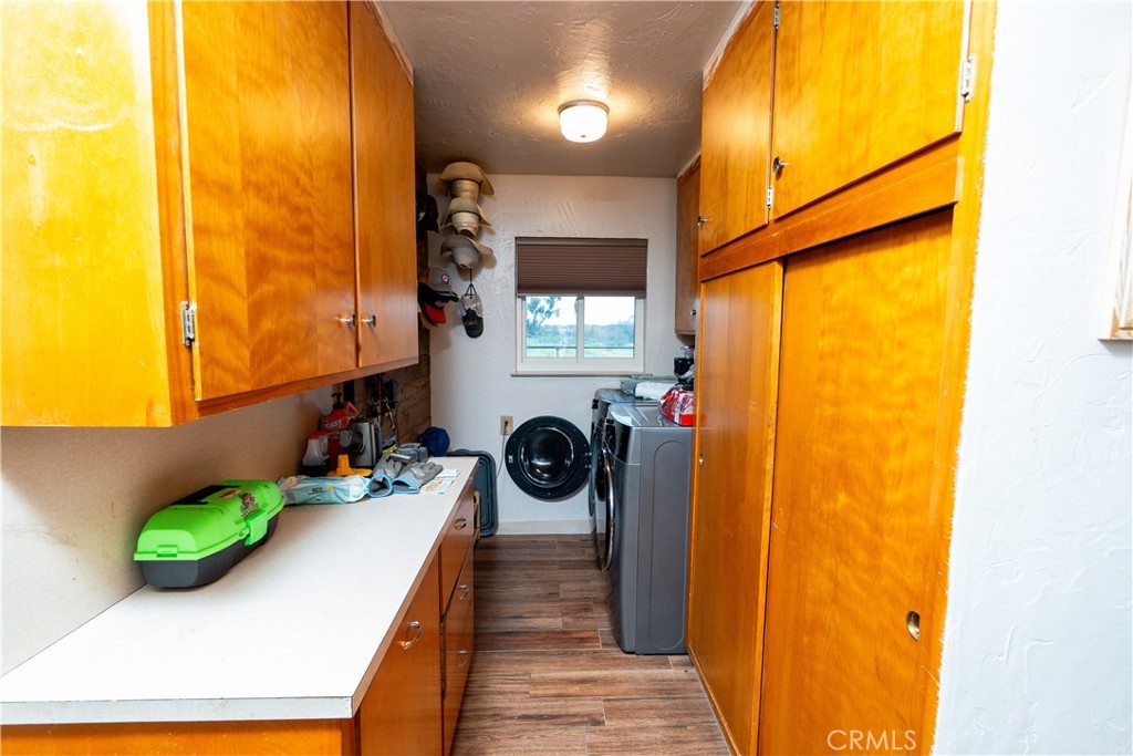 25565 Road 13 Chowchilla, CA 93610 - Photo 22 of 64 a bathroom with a sink and mirror with shower