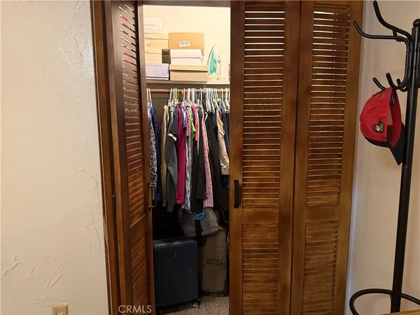 a kitchen with refrigerator and window