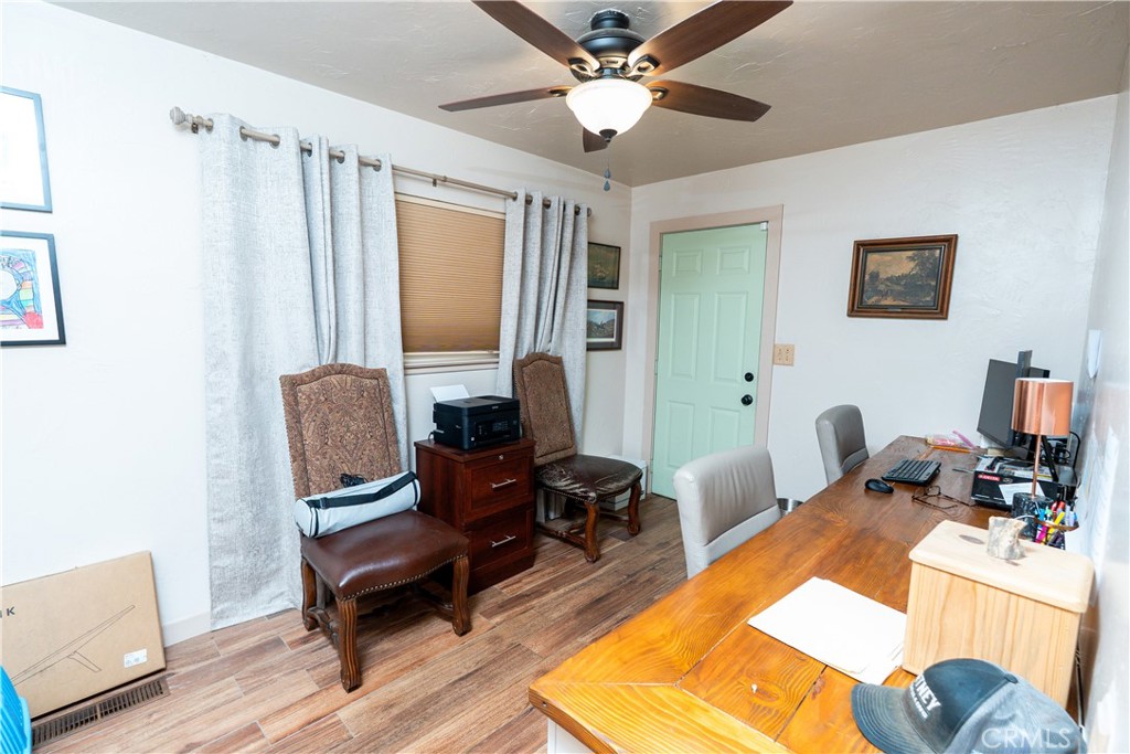 25565 Road 13 Chowchilla, CA 93610 - Photo 24 of 64 a room with furniture and a chandelier