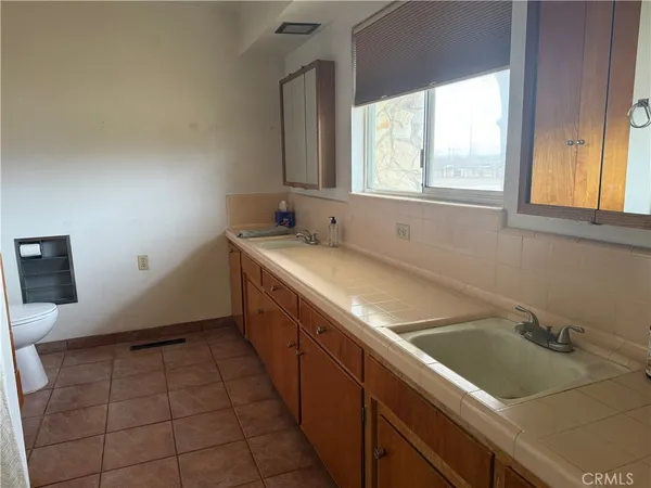 a view of a porch and garden