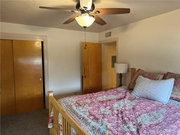 a view of a terrace with wooden floor and a terrace view