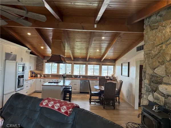 a kitchen with a stove and cabinets