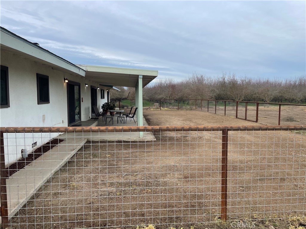 25565 Road 13 Chowchilla, CA 93610 - Photo 64 of 64 a view of swimming pool with outdoor seating