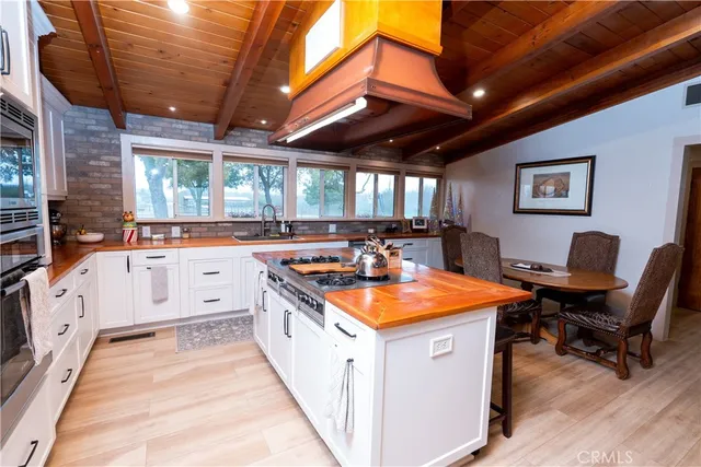 a table and chairs in front of a building