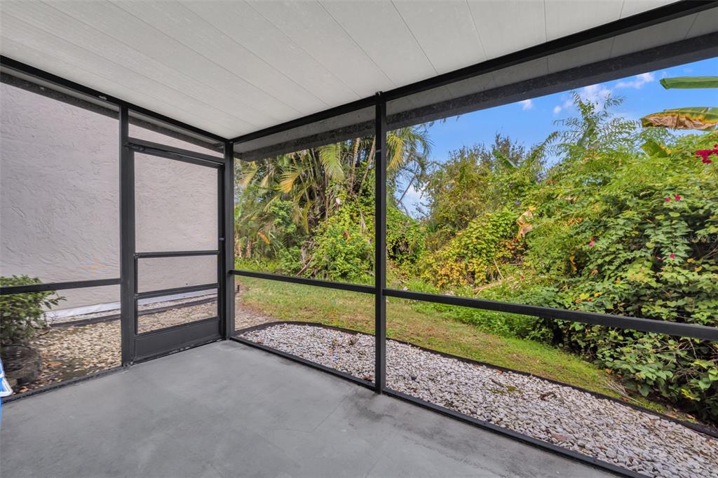 5377 Vineland Road, Unit 1D Orlando, FL 32811 - Photo 21 of 25 a view of a room with wooden floor and a bench