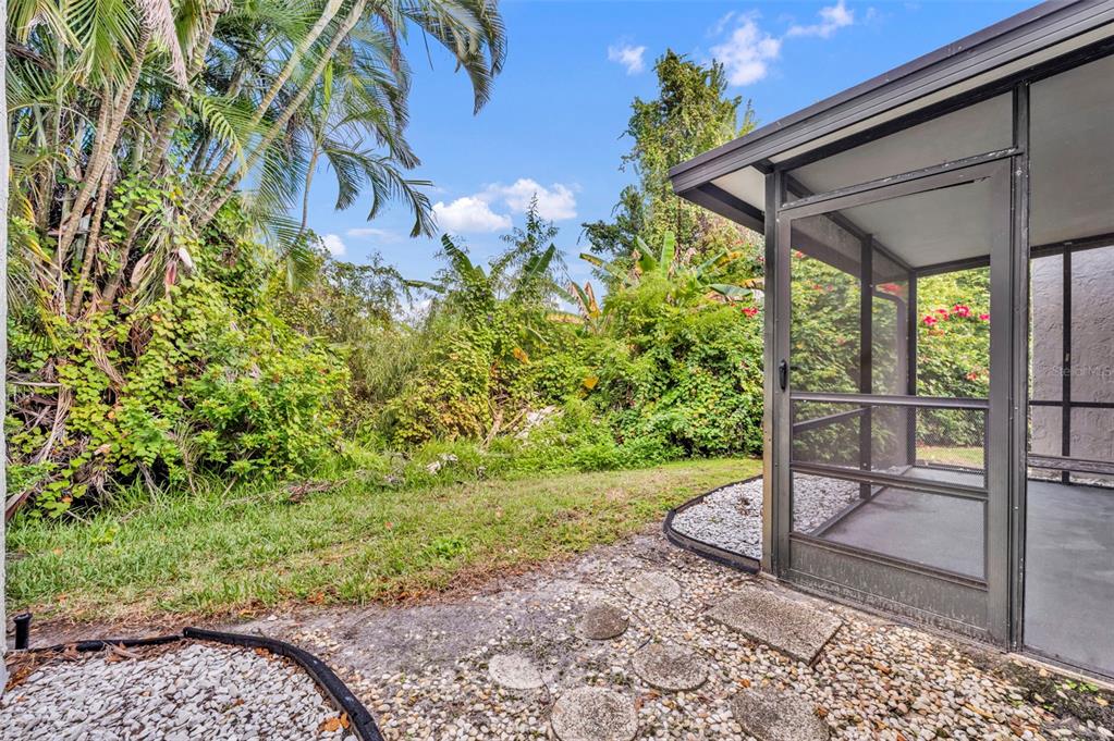 5377 Vineland Road, Unit 1D Orlando, FL 32811 - Photo 22 of 25 a view of a yard with plants and garden