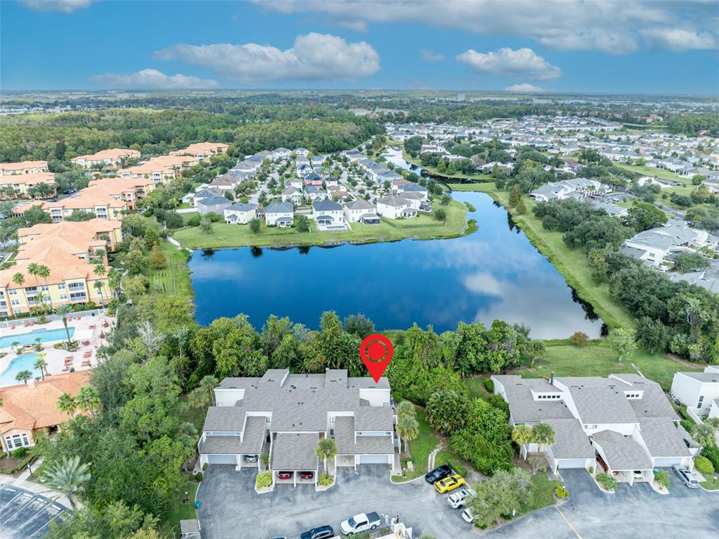 5377 Vineland Road, Unit 1D Orlando, FL 32811 - Photo 25 of 25 an aerial view of residential houses with outdoor space and river