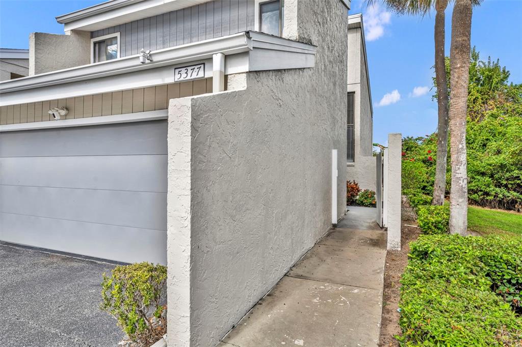 5377 Vineland Road, Unit 1D Orlando, FL 32811 - Photo 3 of 25 a view of a pathway along a building
