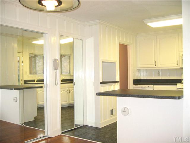 3519 Baugh Street Raleigh, NC 27604 - Photo 6 of 25 This angle shows the kitchen from the dining room. The kitchen has two large pantries. Plenty of room for food, bevarages, linens, and more!